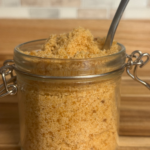 Jar of homemade brown sugar made with white sugar and molasses