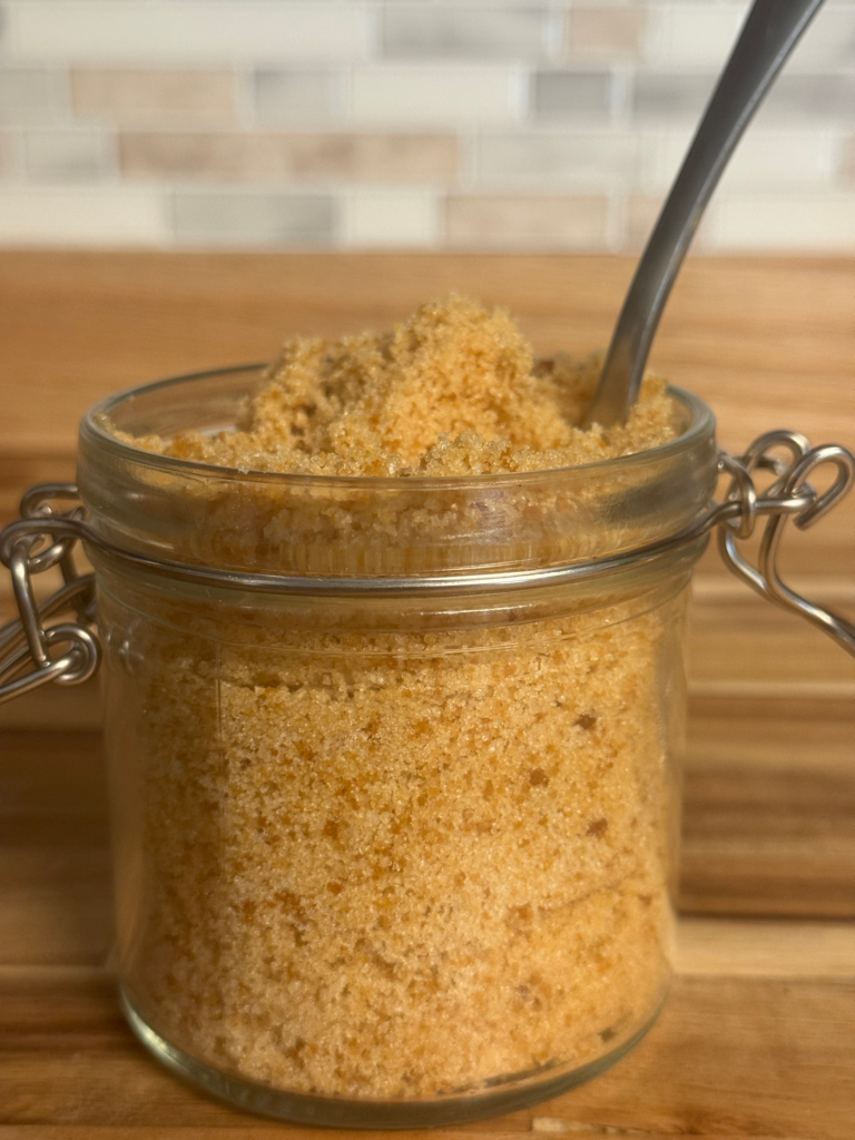 Jar of homemade brown sugar made with white sugar and molasses
