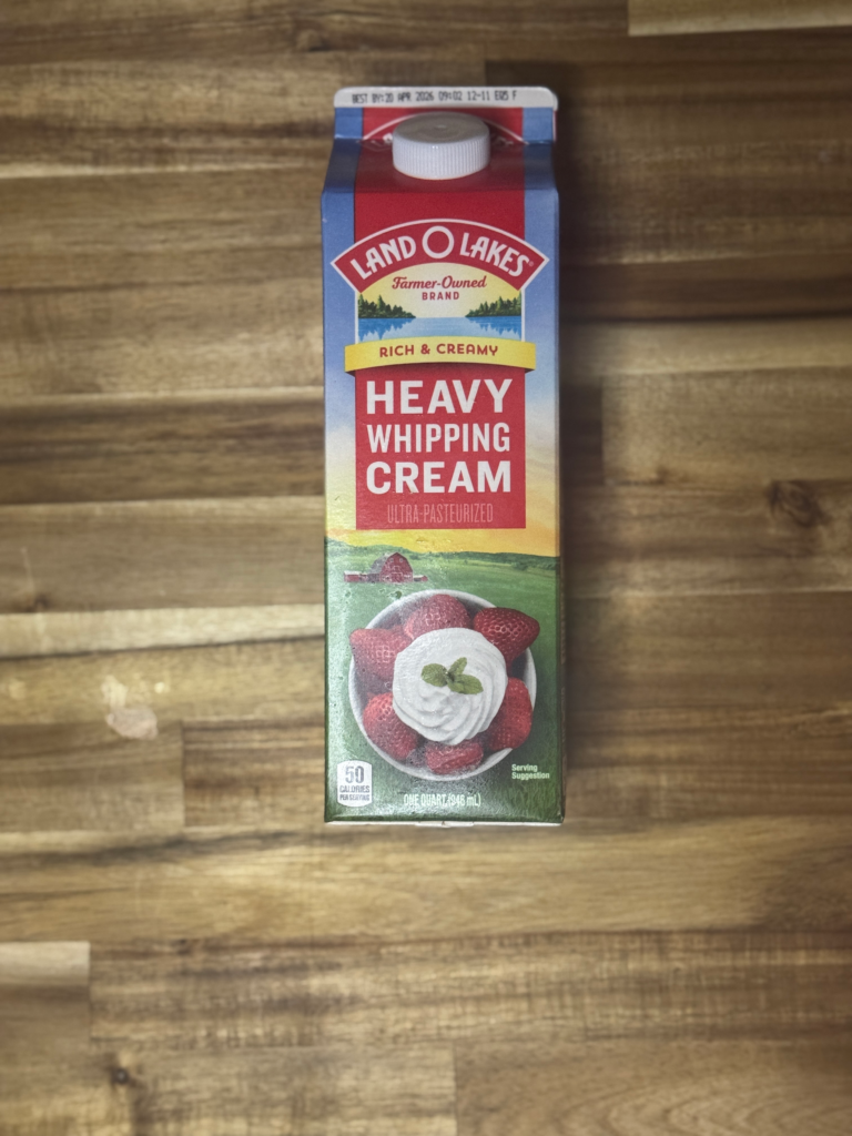 Carton of heavy whipping cream used to make homemade butter from scratch.