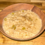 Old-fashioned Southern chicken and dumplings served in a bowl with tender shredded chicken and soft homemade dumplings in a creamy broth.
