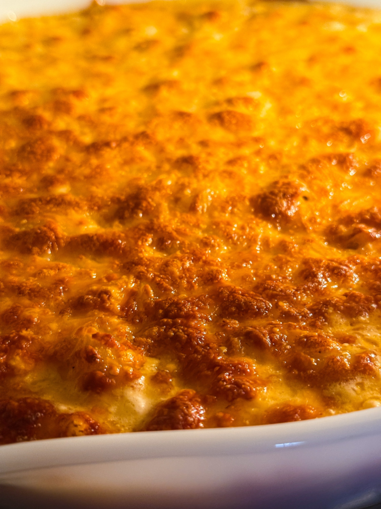 Golden baked mac and cheese with crispy cheesy top fresh out of the oven for Tini’s viral TikTok baked mac and cheese recipe