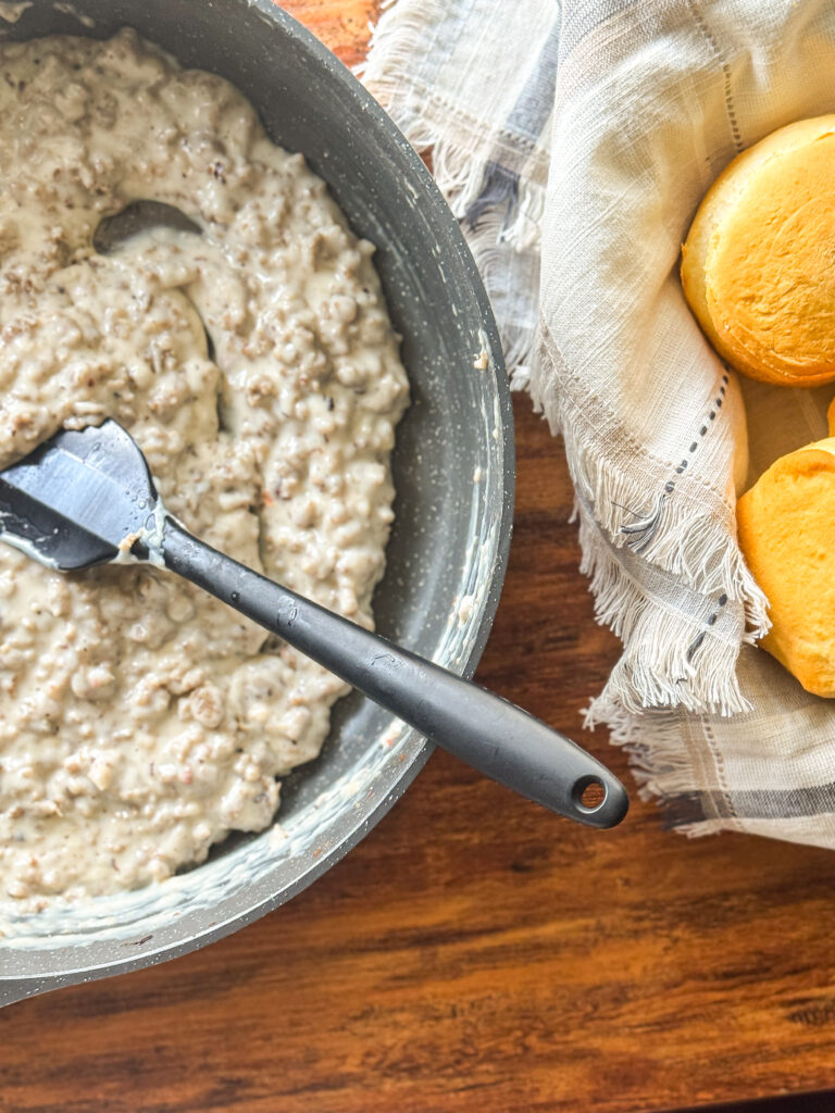 homemade sausage gravy served over biscuits southern breakfast